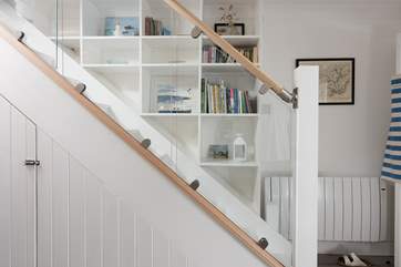 The stylish staircase leads to the first floor.