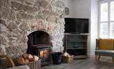 Warm your toes by the wood-burner. - Thumbnail Image