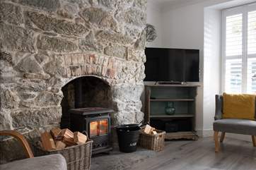 Warm your toes by the wood-burner.