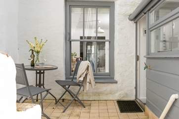 This secluded spot outside the back door is perfect for your morning coffee or evening aperitif.