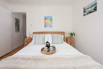 Bedroom 1 has a king-size bed, perfect for a restful night.