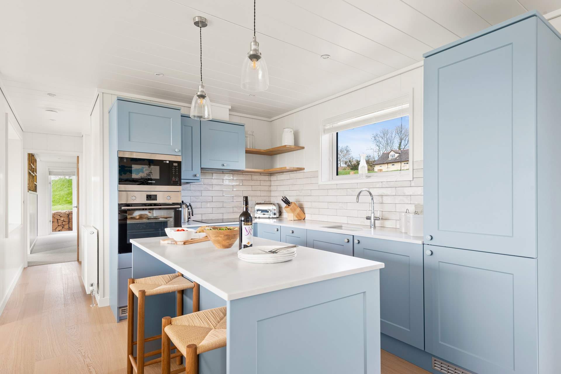 The delightful kitchen is perfect for dinner for two.