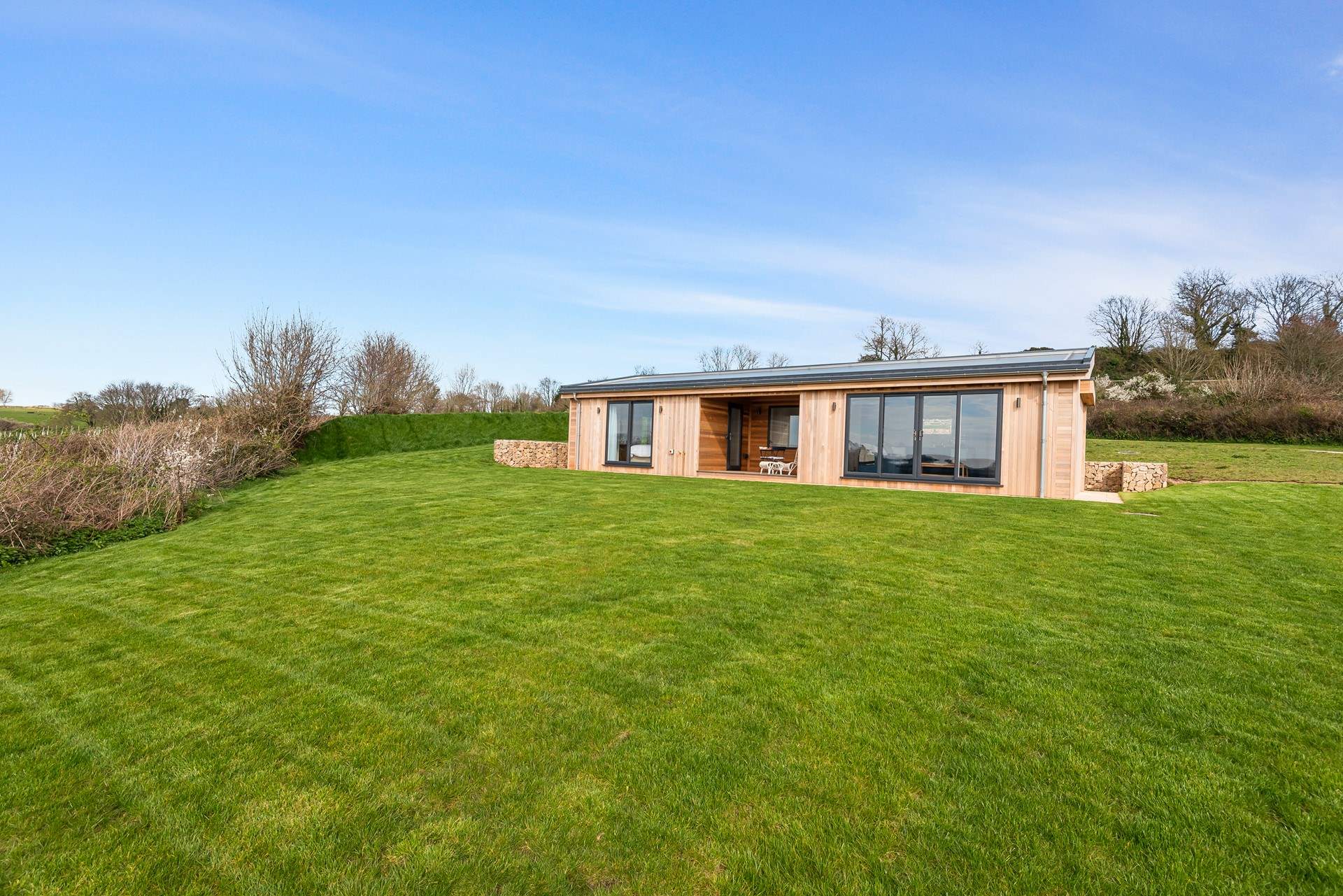 One of five secluded retreats, Maypool Hideaway is surrounded by nature.