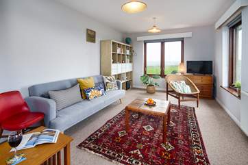 Chill out with a glass of wine or enjoy your favourite movie. There's even a piano in the second sitting-room.
