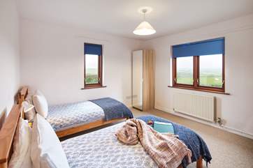 Twin room with panoramic rural views.