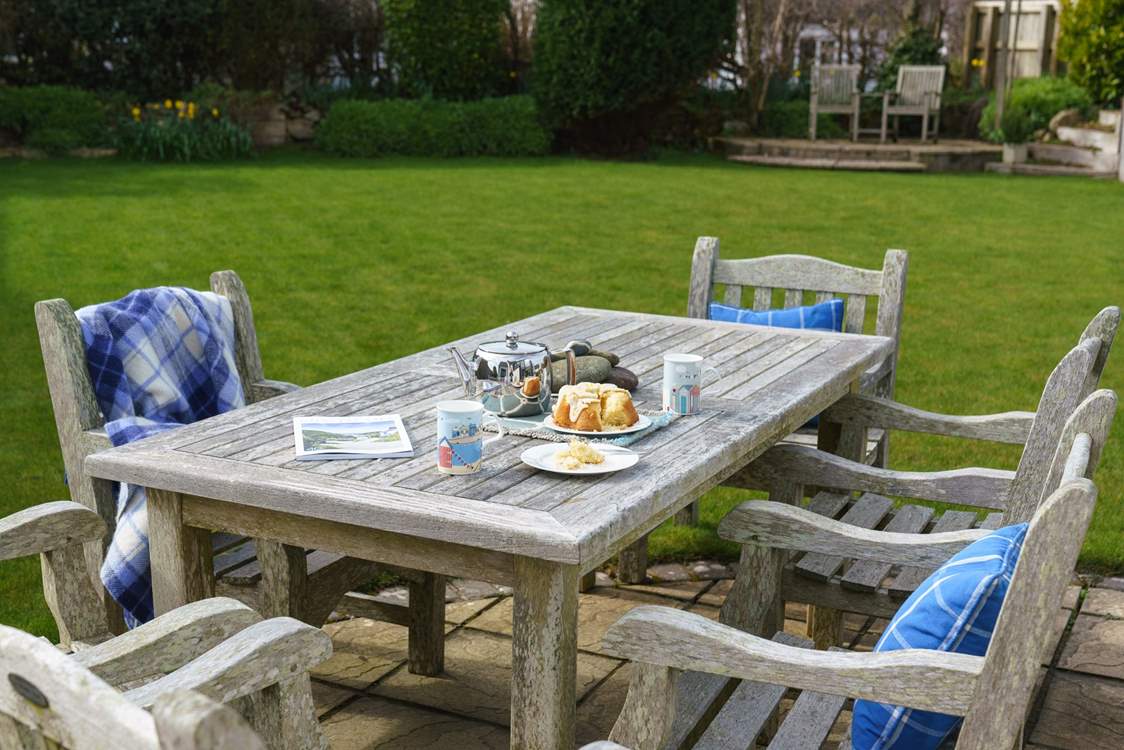 Cup of tea in the garden anyone, with a delicious piece of cake.