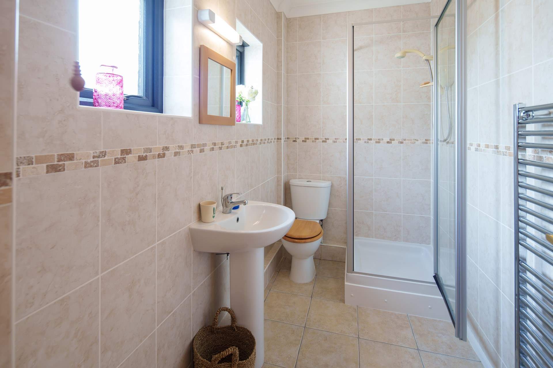 Enjoy some holiday pampering in the en suite shower-room.