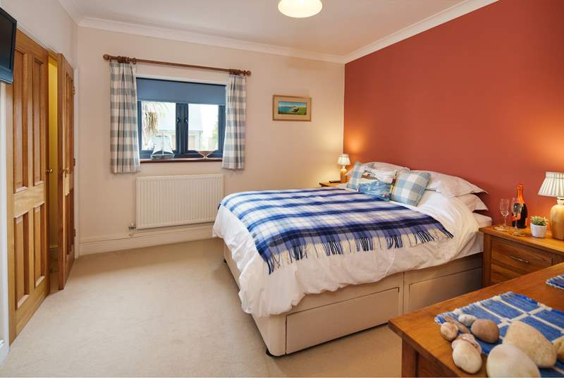  A good night's sleep is promised in one of two double en suite bedrooms on the ground floor. 