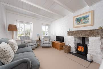 The cosy sitting-room has a wood-burner to keep you warm whatever the weather.
