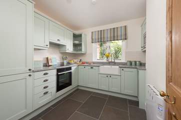 The kitchen has all the equipment you'll need including the all-important dishwasher.