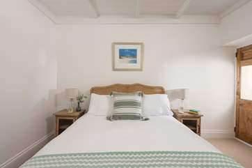 The lovely double bedroom on the ground floor.