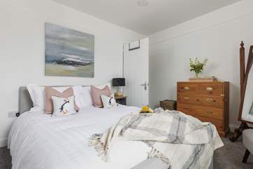The bedrooms are stylishly furnished with comfort in mind. This is bedroom 1 and looks out over the front of the house.