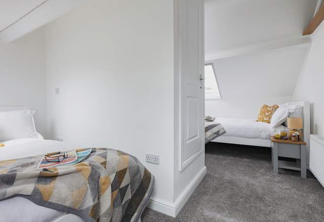 Bedroom 3 is the perfect hangout room offering two double beds and views across the rooftops.