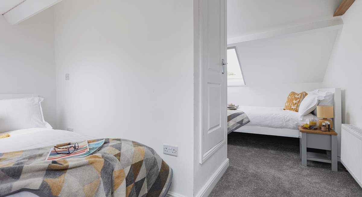 Bedroom 3 is the perfect hangout room offering two double beds and views across the rooftops.