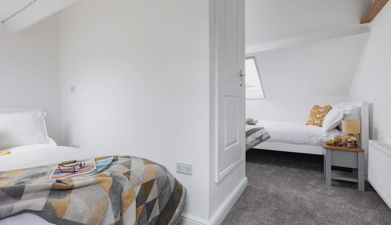 Bedroom 3 is the perfect hangout room offering two double beds and views across the rooftops.