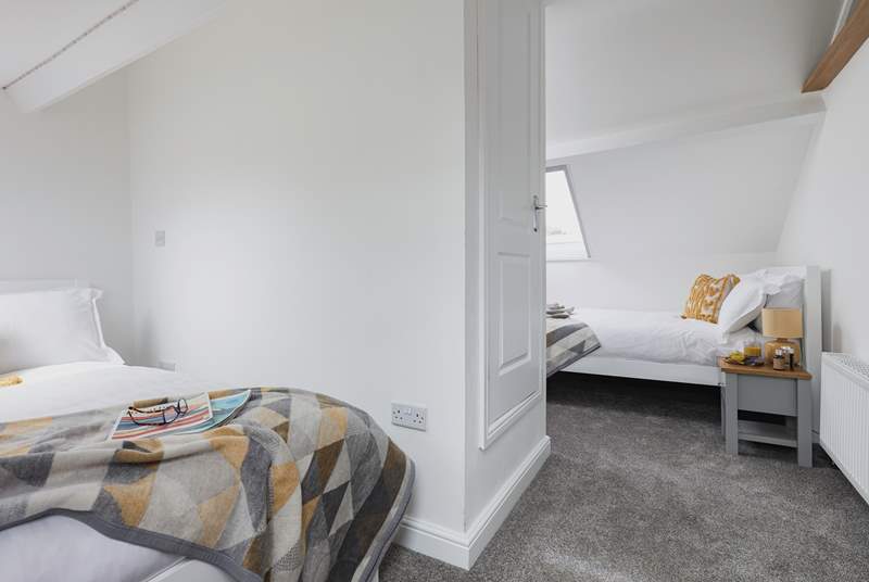 Bedroom 3 is the perfect hangout room offering two double beds and views across the rooftops.