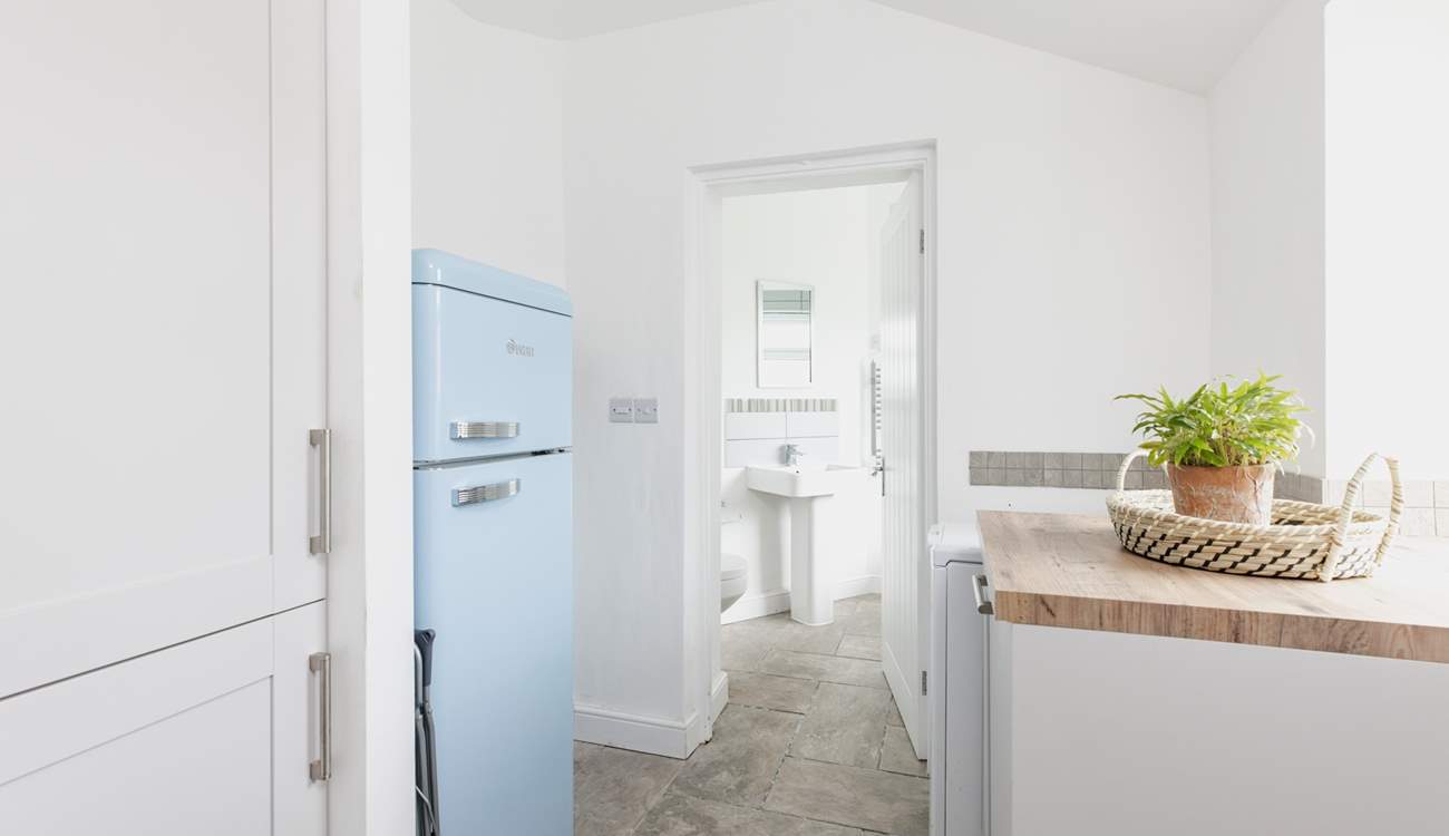 The handy utility-room leads into the ground floor bathroom.