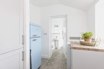 The handy utility-room leads into the ground floor bathroom.