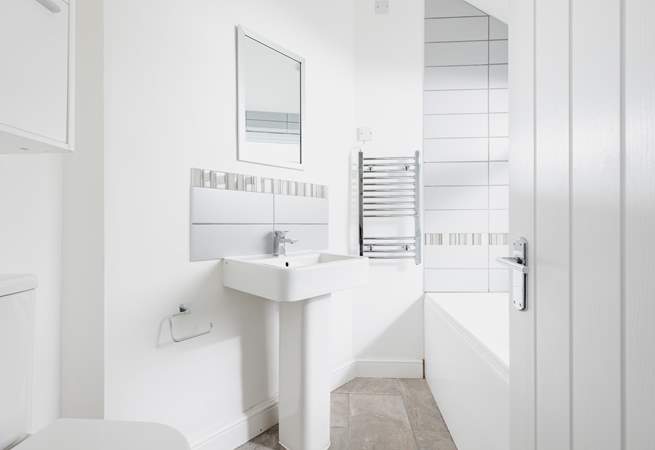 The ground floor bathroom is perfect for a long soak after a busy day.