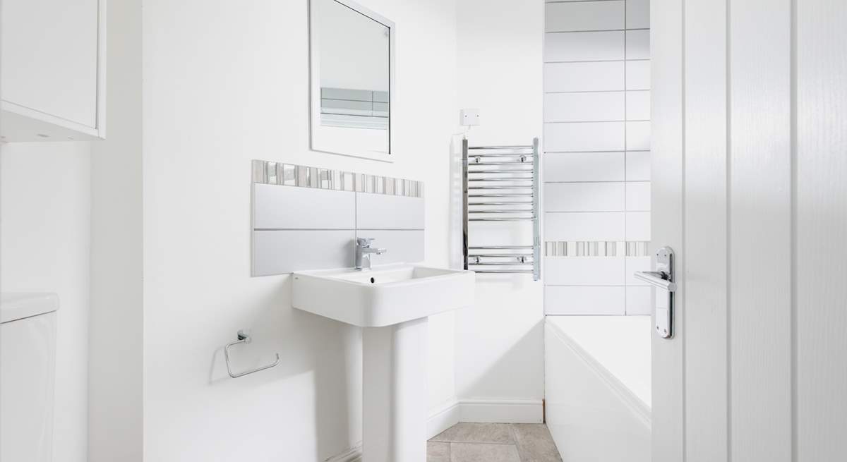 The ground floor bathroom is perfect for a long soak after a busy day.