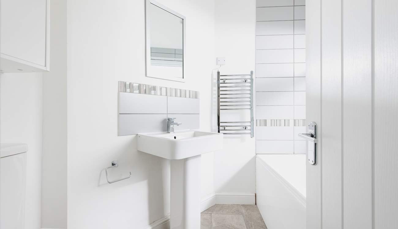 The ground floor bathroom is perfect for a long soak after a busy day.