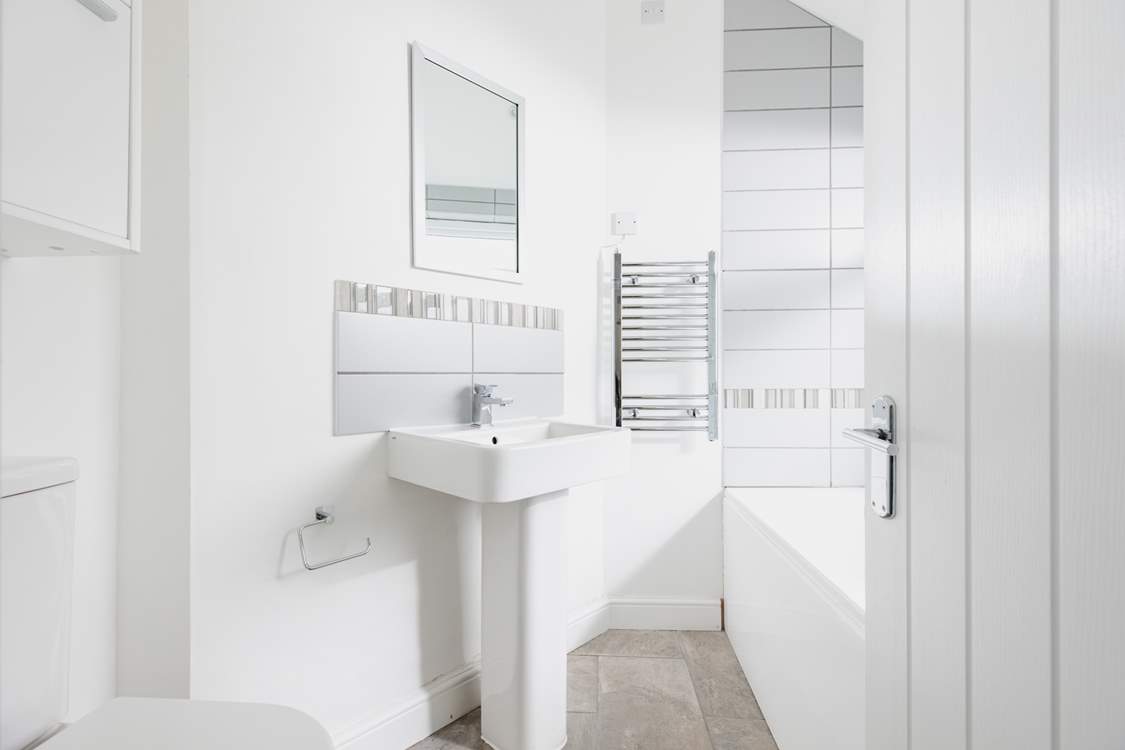 The ground floor bathroom is perfect for a long soak after a busy day.