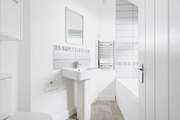 The ground floor bathroom is perfect for a long soak after a busy day.