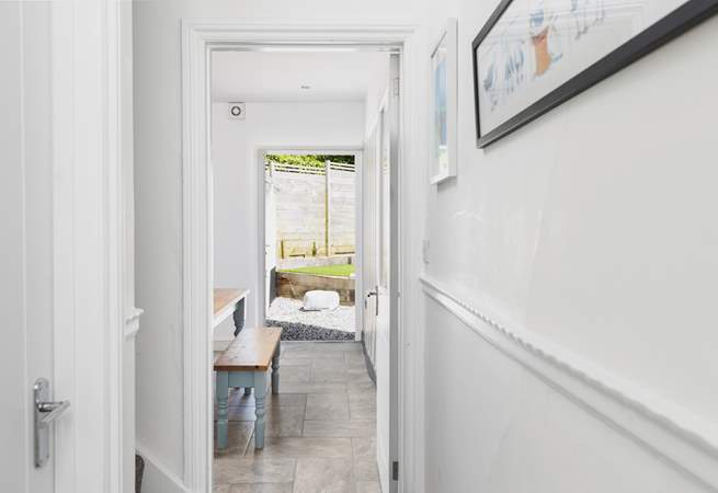 From the front door with the sitting-room on the left, stairs and the ktichen/diner.