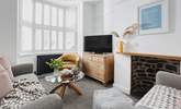 The cosy sitting-room has a Smart TV for your evening entertainment.  - Thumbnail Image