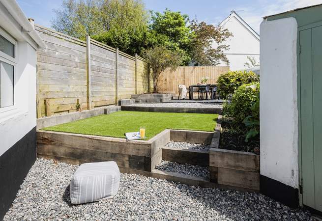 The beautifully maintained rear garden is perfect for al fresco dining and the family dog!