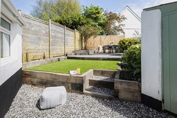 The beautifully maintained rear garden is perfect for al fresco dining and the family dog!