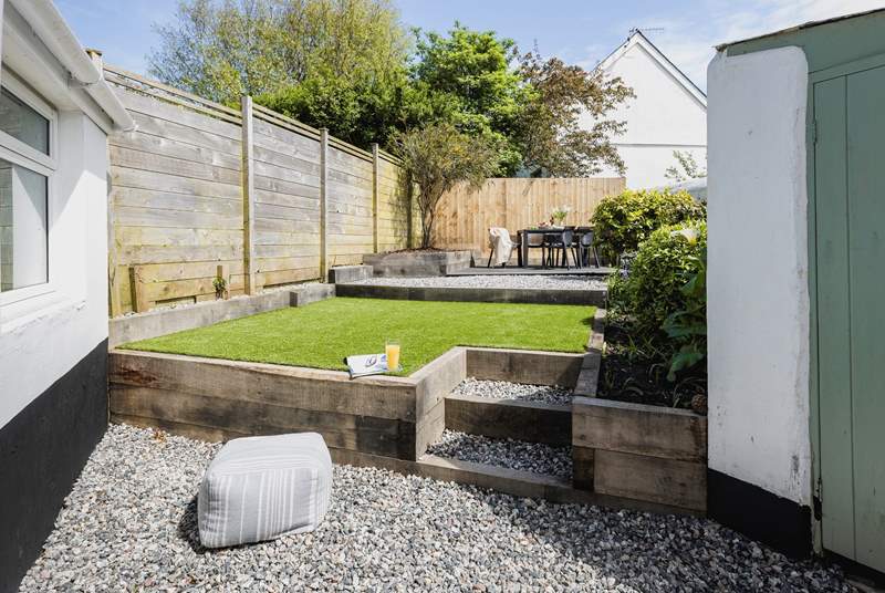 The beautifully maintained rear garden is perfect for al fresco dining and the family dog!
