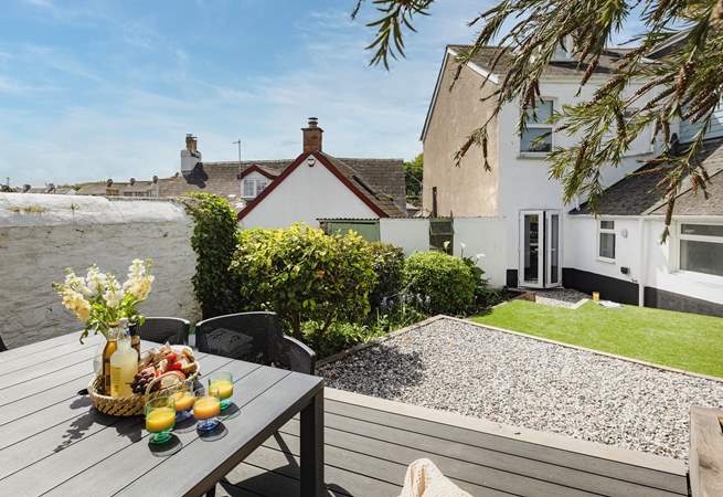 Enjoy al fresco dining in the secluded rear garden.