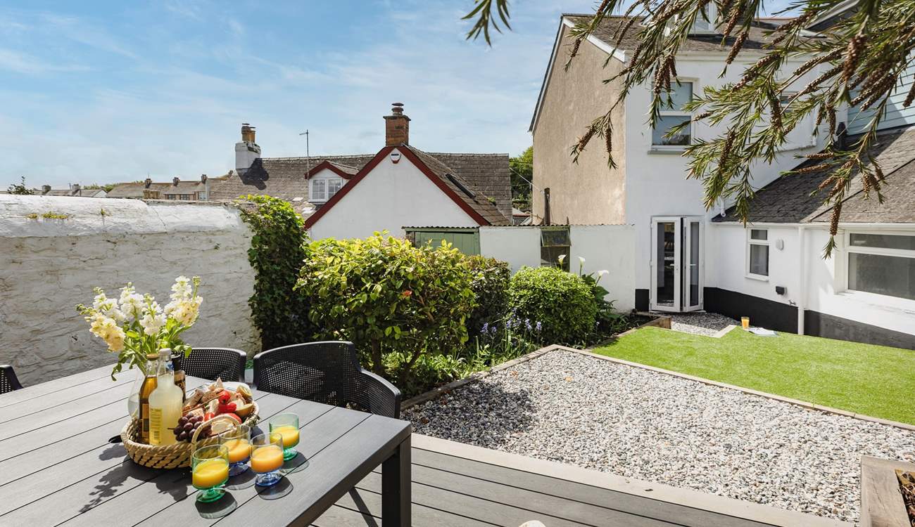 Enjoy al fresco dining in the secluded rear garden.