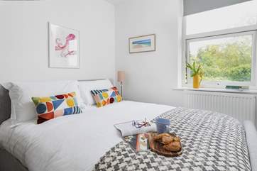 Stylish bedroom 2 looks out over the back of the house and fabulous garden.