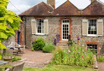 There is a gorgeous enclosed cottage garden.
