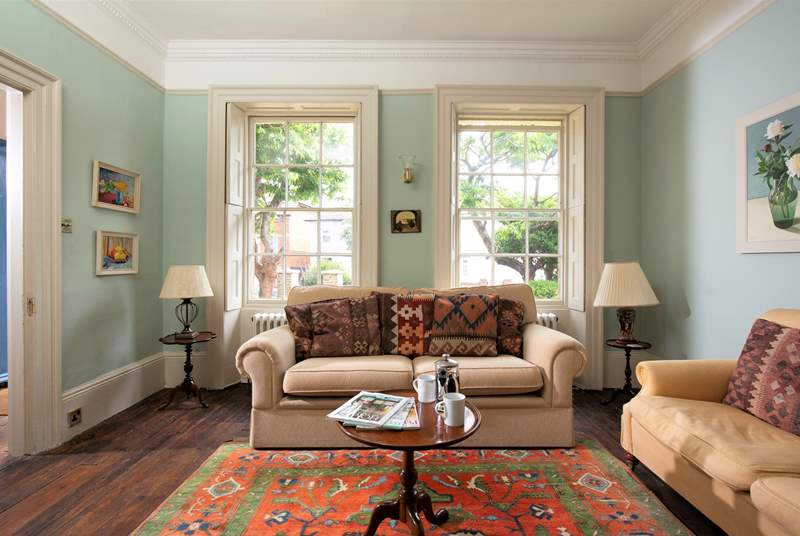 The sitting-room has a wealth of character.