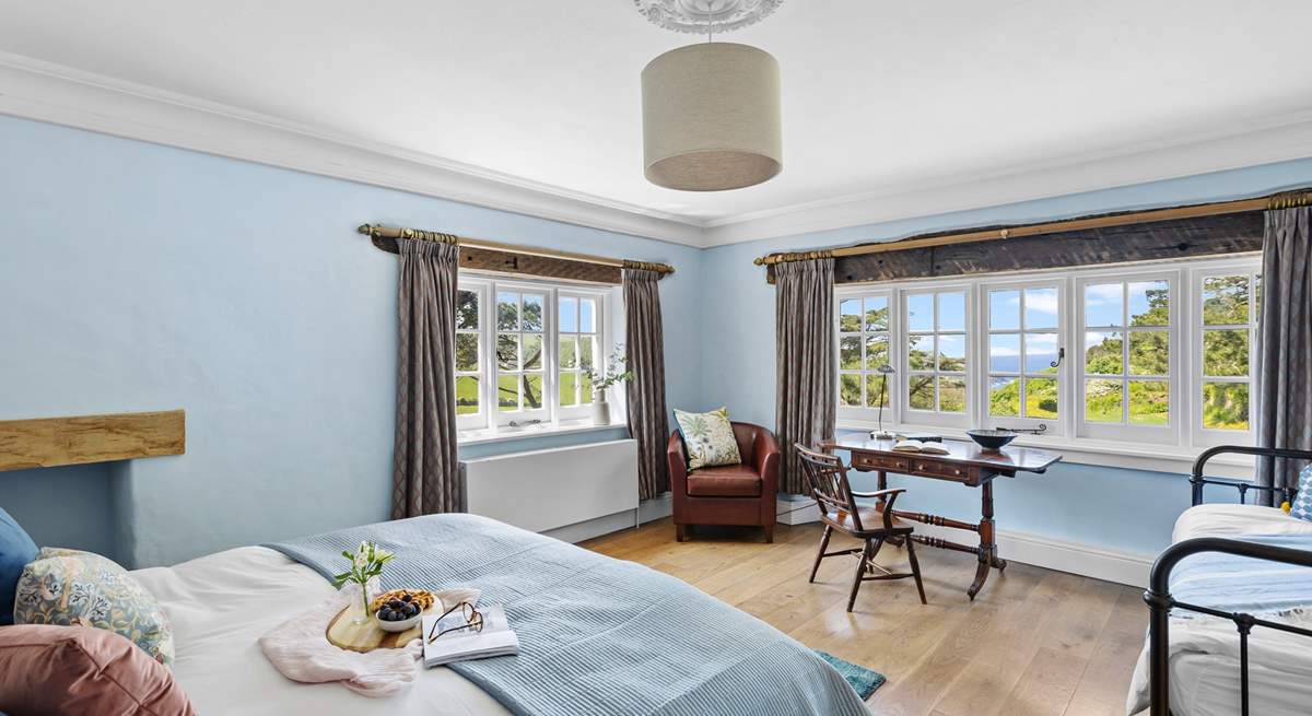 Bedroom 2 offers the perfect family room with a king-size double bed, a single day bed and of course the view!