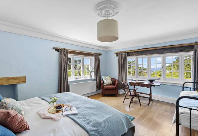 Bedroom  2 offers the perfect family room with a king-size double bed, a single day bed and of course the view!