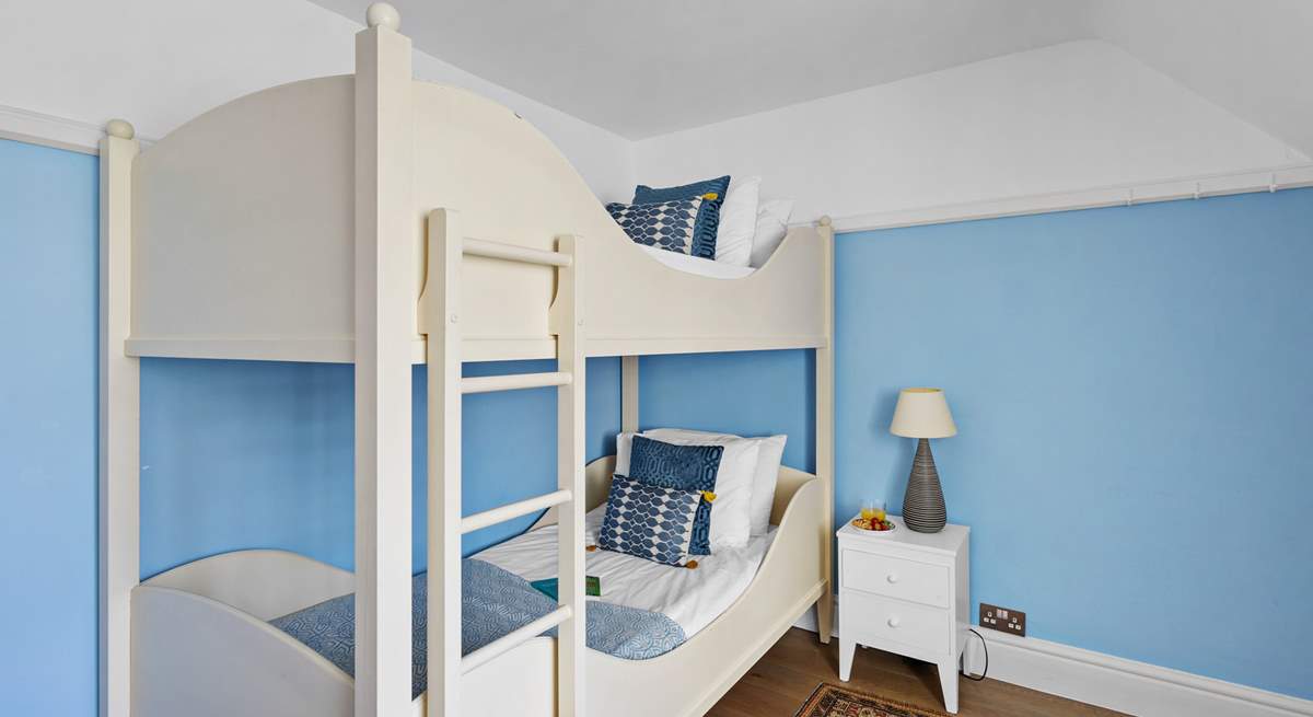 Bedroom 6 offers 3ft bunk beds and views out across the valley.