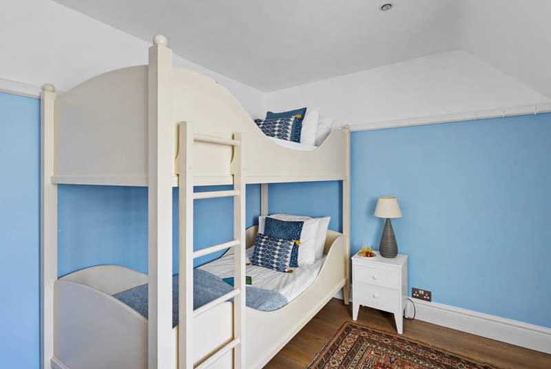 Bedroom 6 offers 3ft bunk beds and views out across the valley.