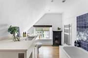 This lovely bathroom sits at the end of the corridor opposite bedroom 7.