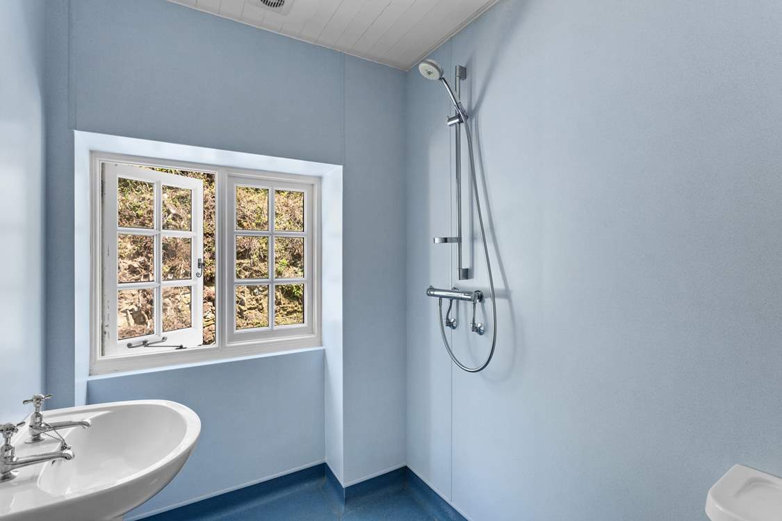 Sitting just off the landing you will find this wet-room.