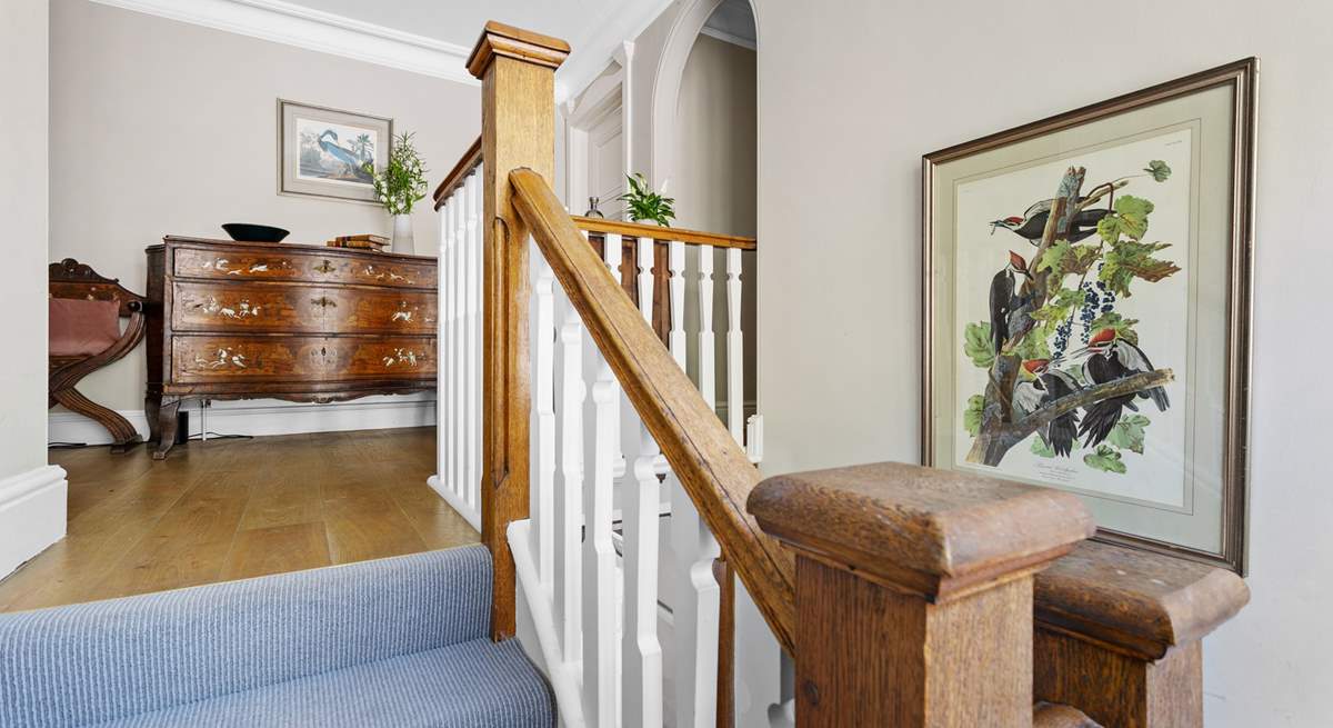 Head up the stairs to the first floor where you will find four of the seven bedrooms.