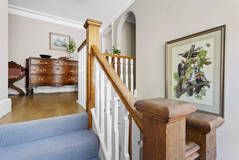 Head up the stairs to the first floor where you will find four of the seven bedrooms.