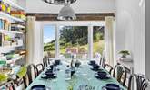 The grand dining-table also has a window seat making this the perfect spot to enjoy a family feast.  - Thumbnail Image