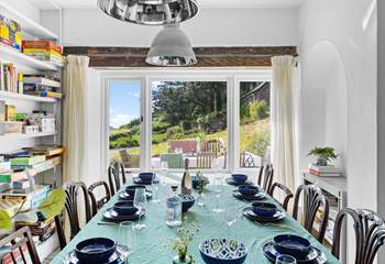The grand dining-table also has a window seat making this the perfect spot to enjoy a family feast. 