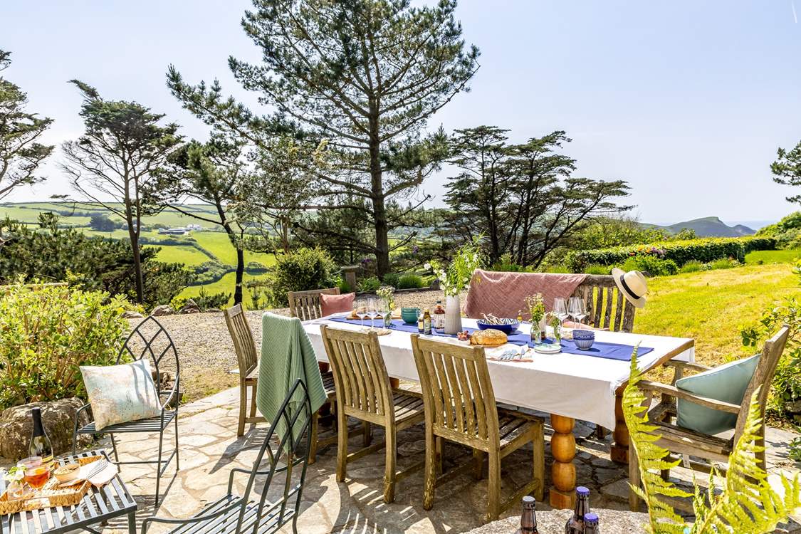 Al fresco dining with far reaching views to the sea.