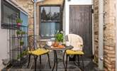 The sweet patio area is perfect for coffee and cake. - Thumbnail Image