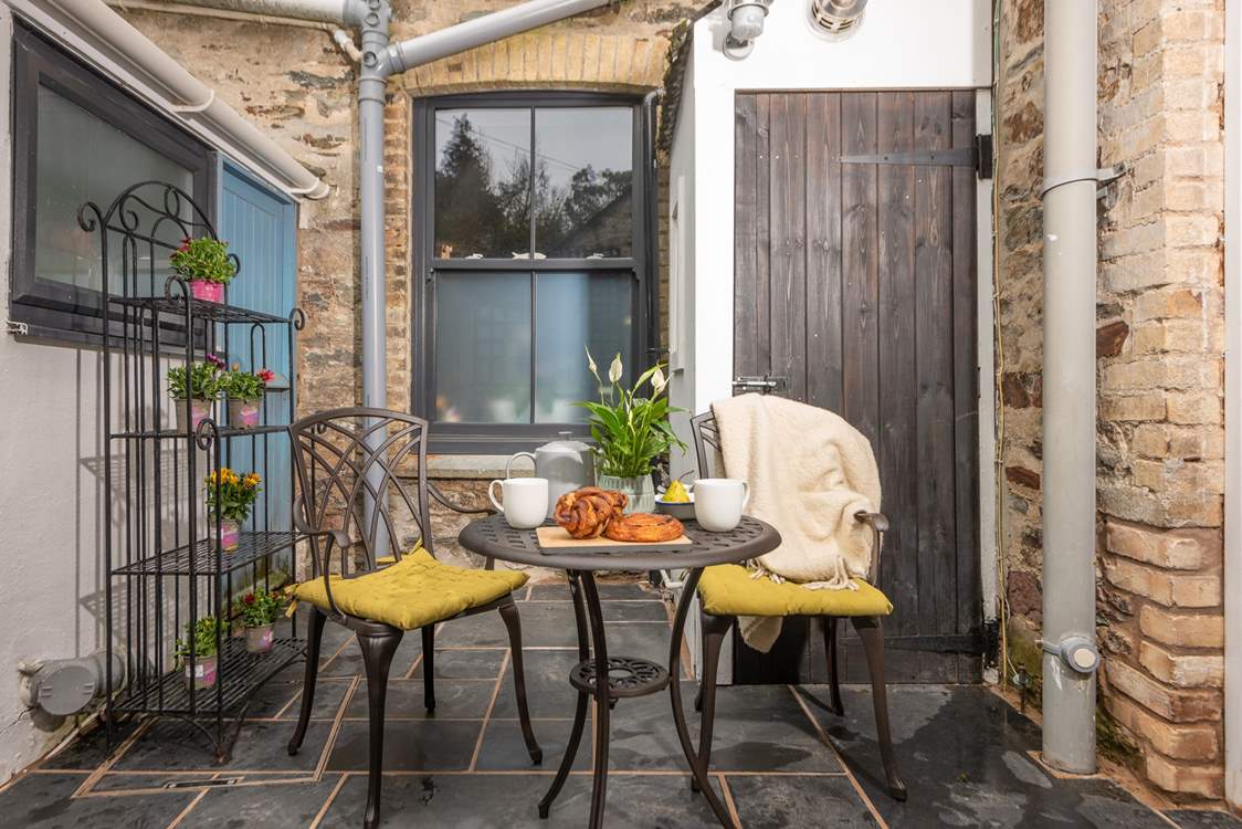 The sweet patio area is perfect for coffee and cake.